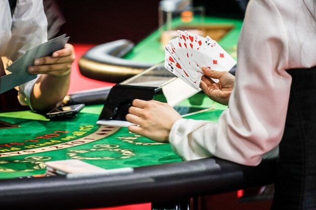 Live dealer spinning the roulette wheel